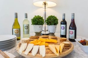 Wine and cheese tray.