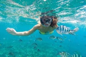 Photo of a Woman Snorkeling on a Key West Honeymoon.
