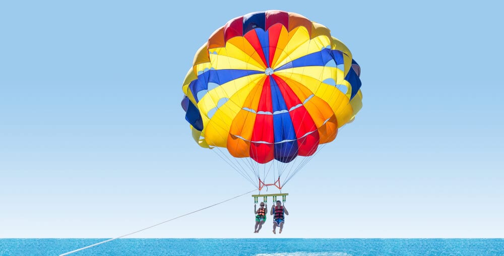A photo of two people parasailing in Key West, Florida.
