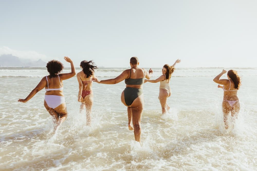 A group of women on the beach during a Key West bachelorette party.